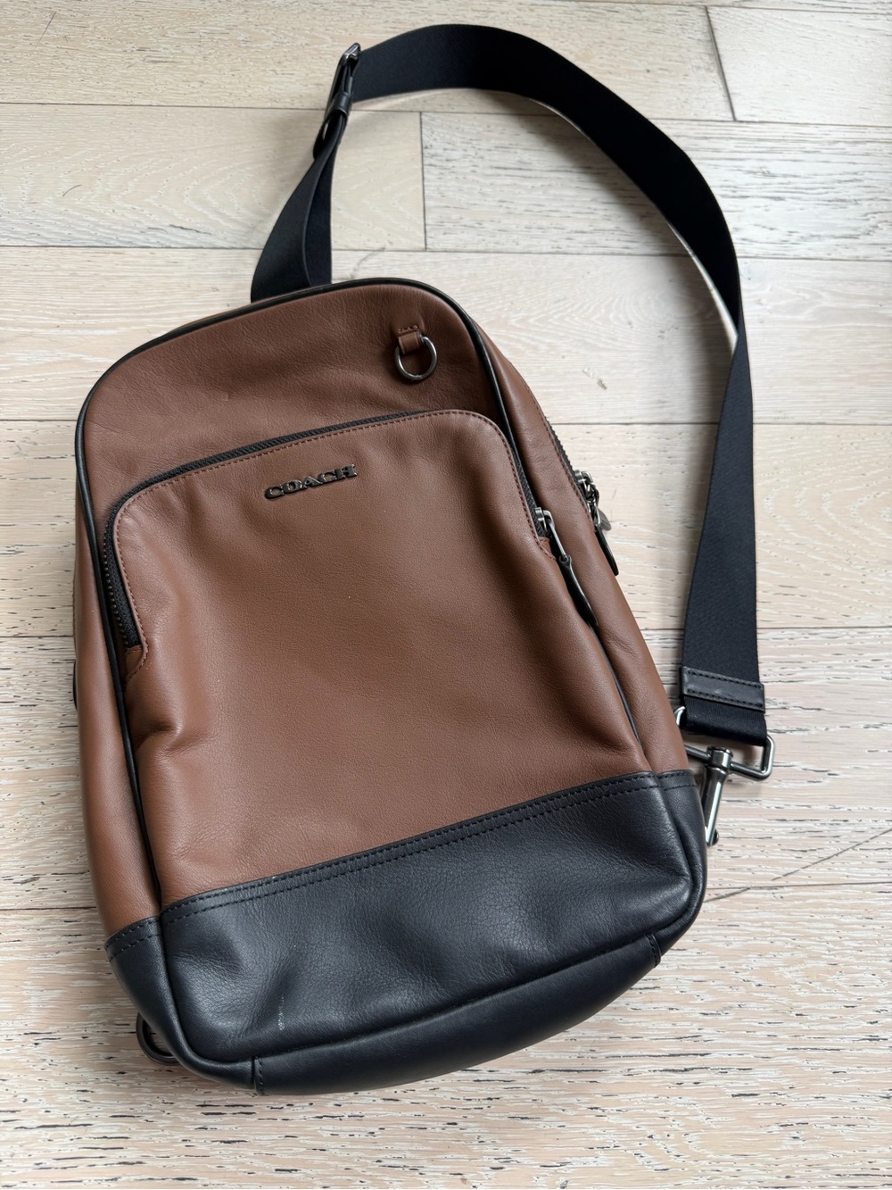 Coach Men’s Brown and Black Leather Sling Backpack